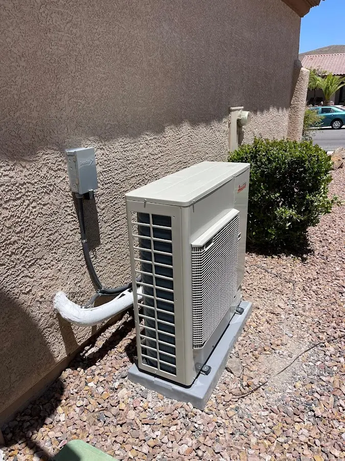 Residential air conditioning condenser unit in Ripley